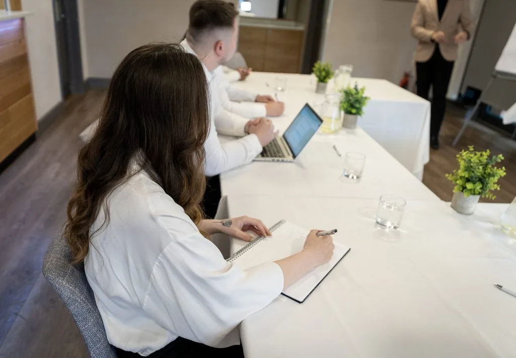 Corporate meeting taking place at conference venue in calverton
